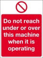 Do not reach under or over this machine...