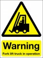 Warning fork lift truck in operation
